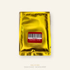 Reverse of the gold foil sachet showing the barcode label and best-before date 12/2028