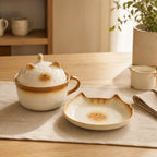Halyvira bread cat ceramic tableware on a warm breakfast table