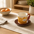 Halyvira waffle dessert ceramic cup and saucer on a warm breakfast table