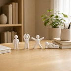 Halyvira white chameleon figurines on a home study desk