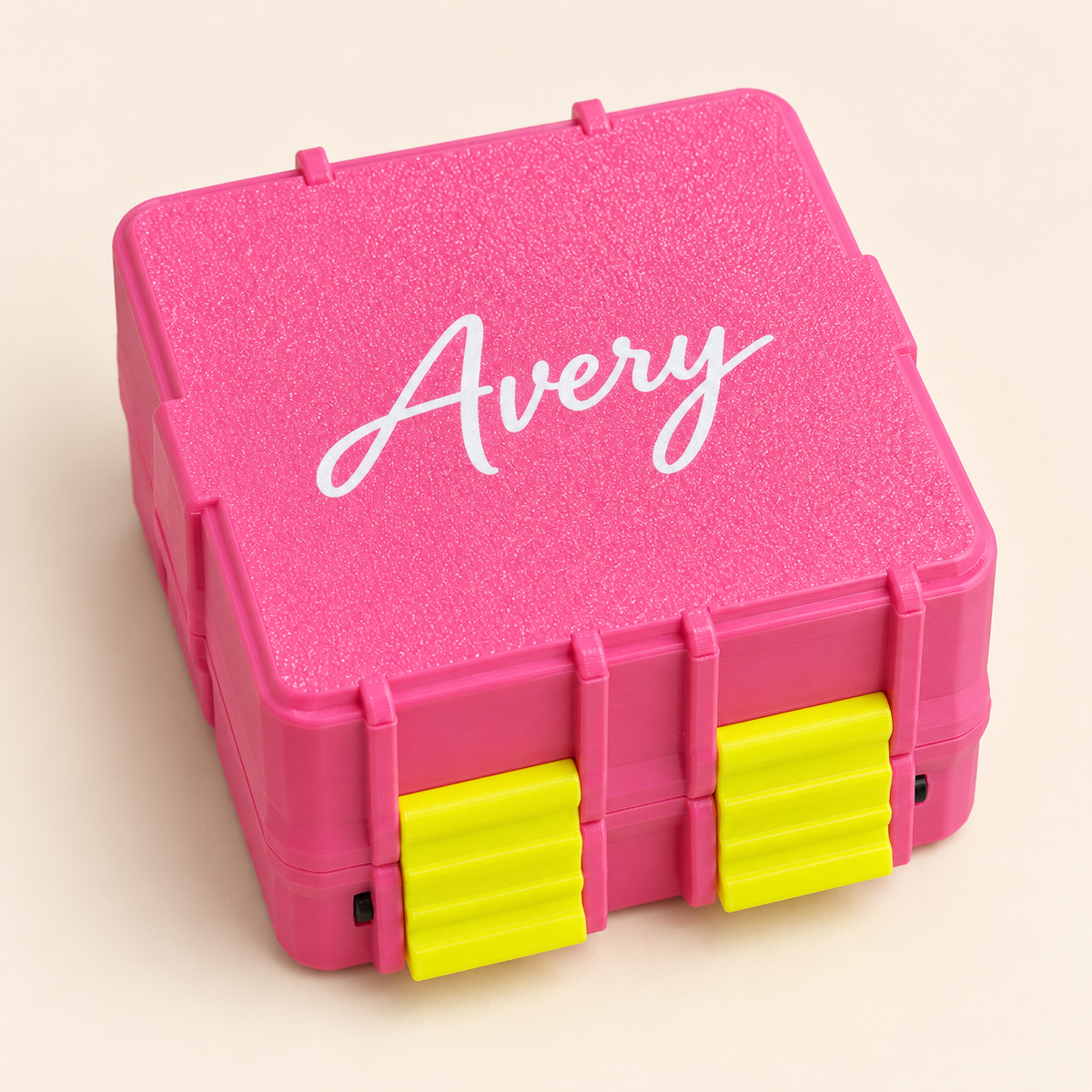 Custom pink vial storage case with yellow latches and the sample name Avery — illustrative preview