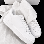 Close-up of pure white low-top casual sneakers