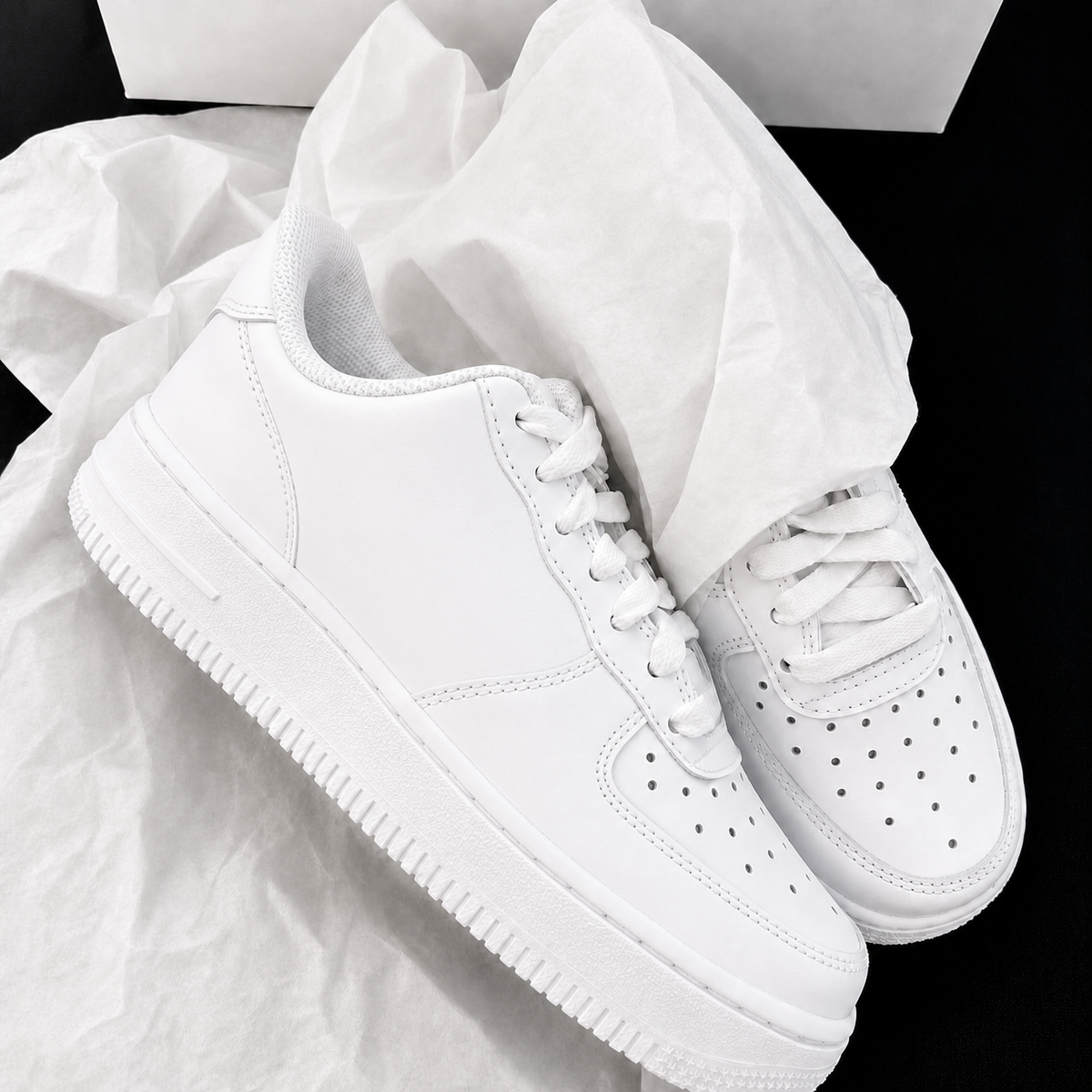 Close-up of pure white low-top casual sneakers
